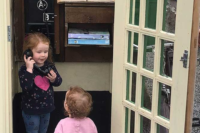 Little Girls with Vintage Telephone Box
